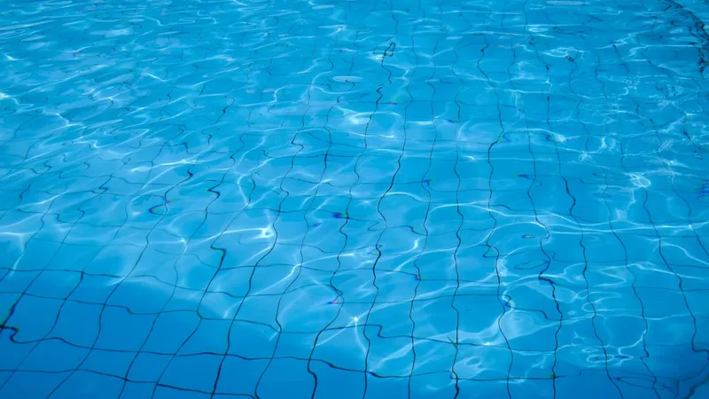 a swimming pool with a net on the bottom of it